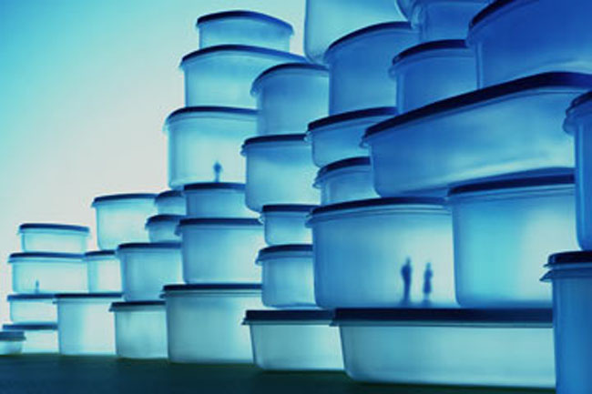 Figurines in plastic food containers